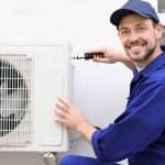Green Air Solutions technician repairs ductless unit